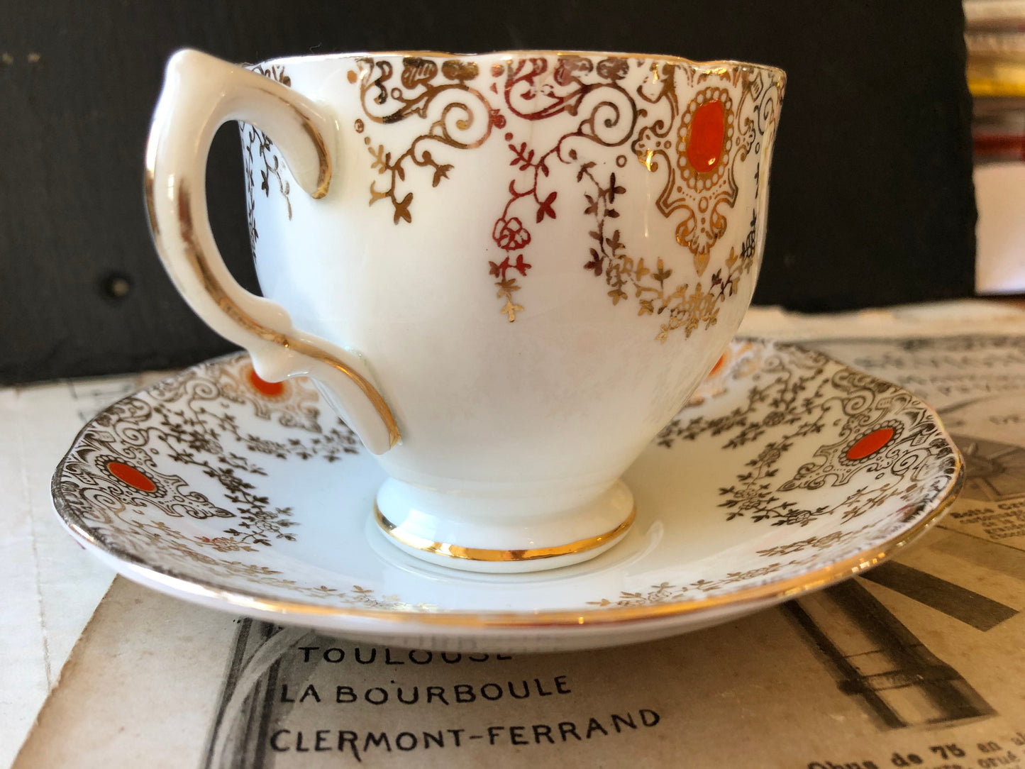 Art Deco Salisbury Bone China Cup and Saucer: Gold Chintz, Orange Detail