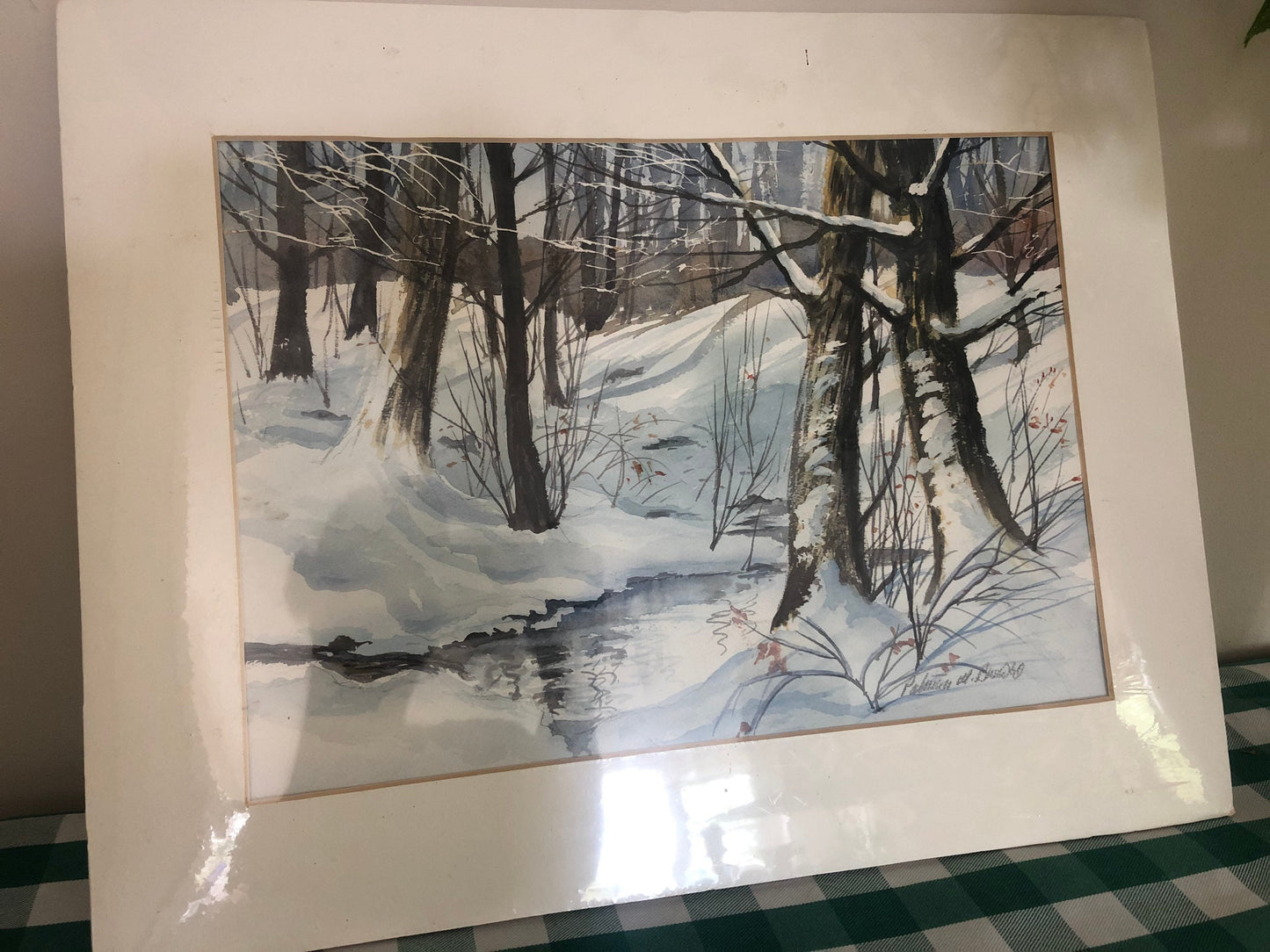 Winter Wood with trees and stream. Mounted unframed print by American artist Patricia M. Browne.