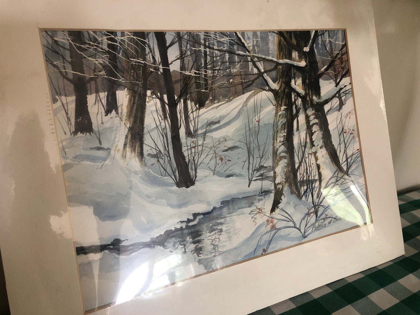 Winter Wood with trees and stream. Mounted unframed print by American artist Patricia M. Browne.