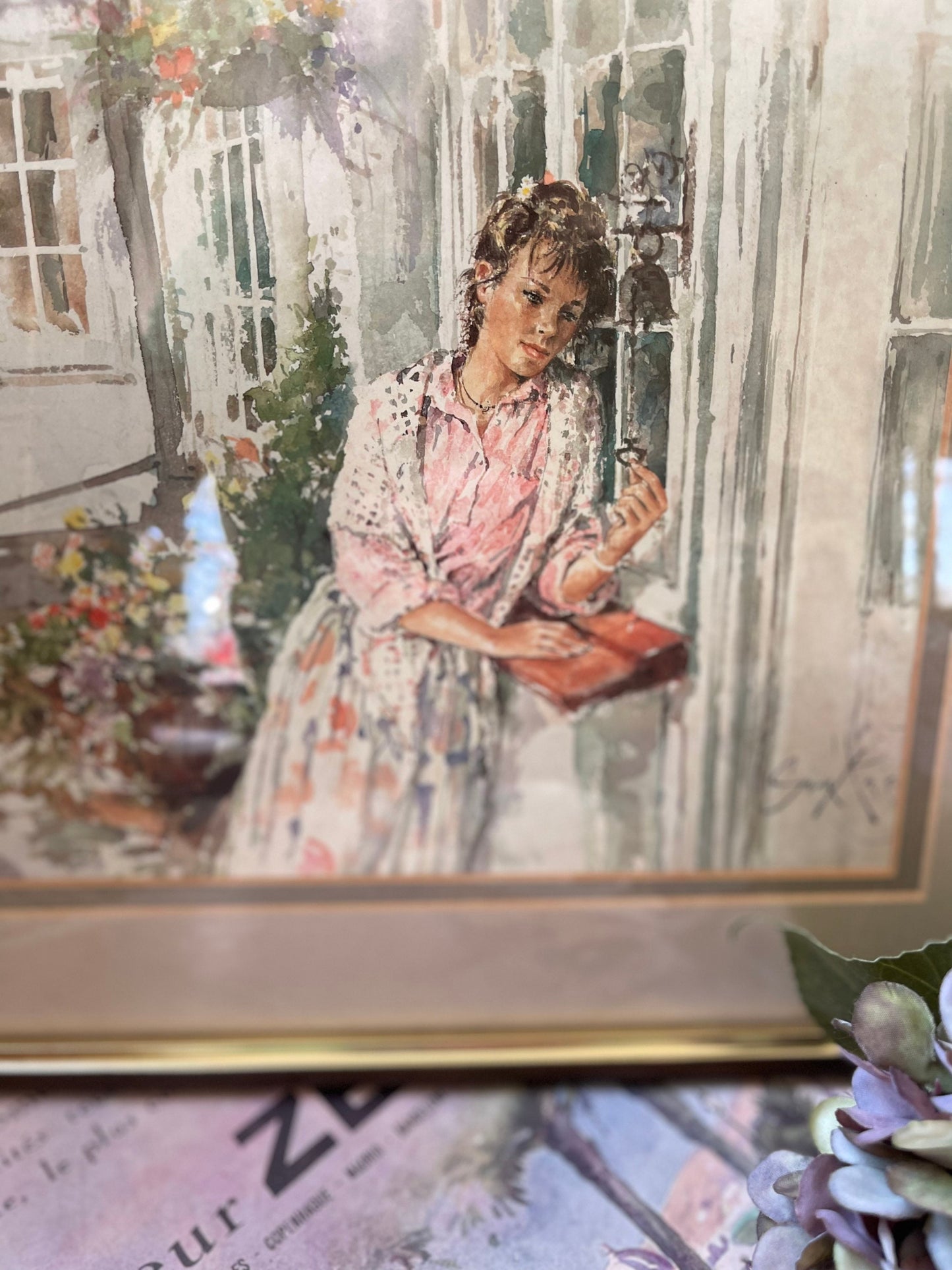 Framed Print of a Watercolour of a Young Woman in a Dress in a Garden