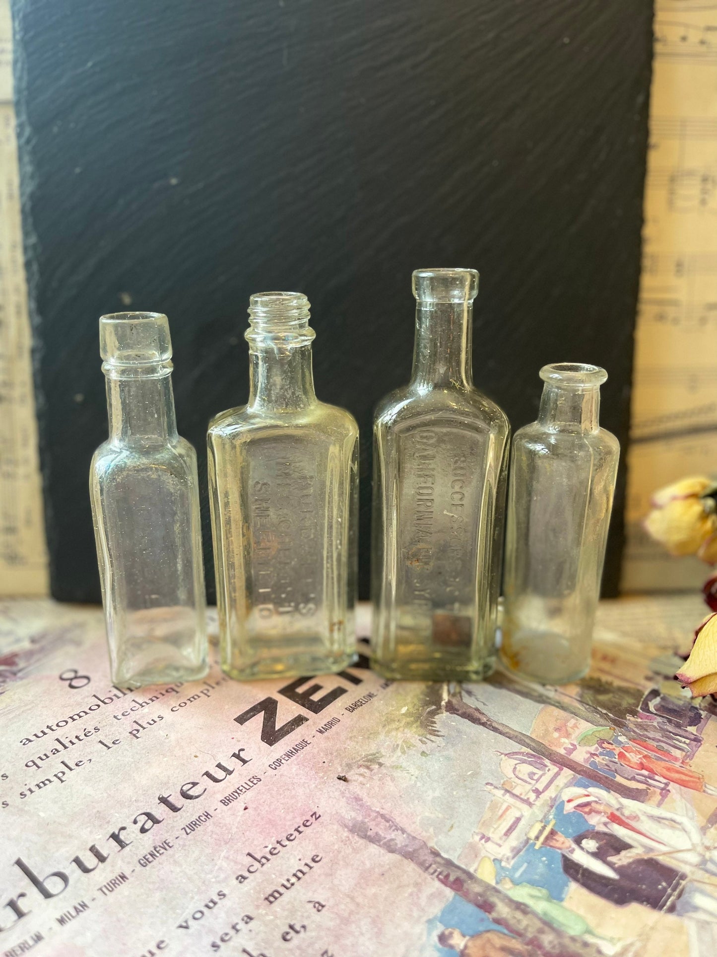 Collection of Four Vintage Clear Glass Bottles - Daddies, Calific, Burdalls