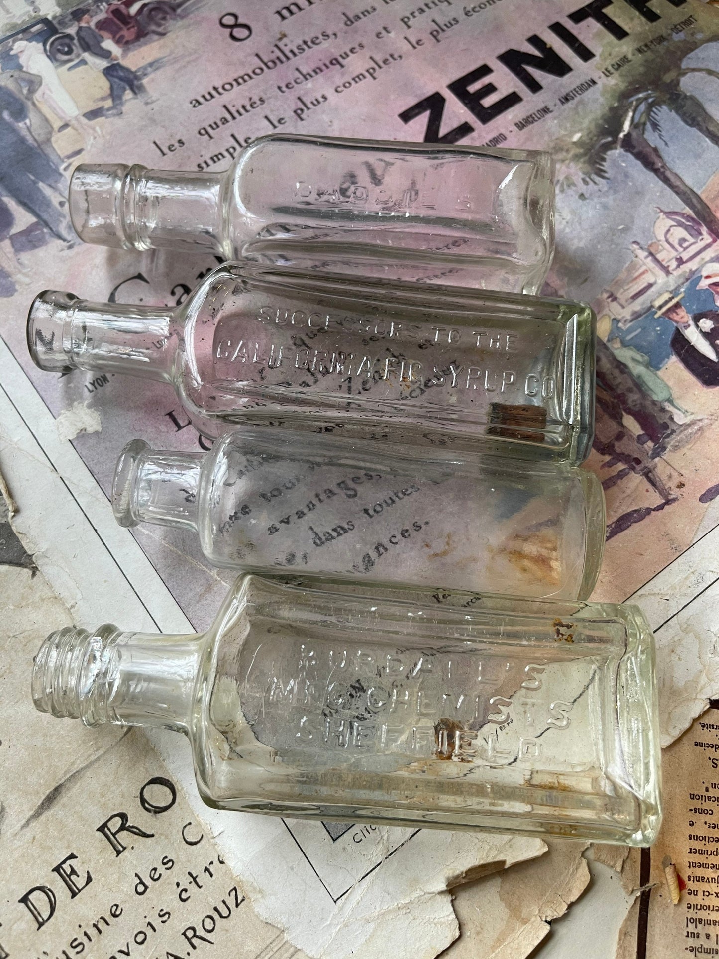 Collection of Four Vintage Clear Glass Bottles - Daddies, Calific, Burdalls