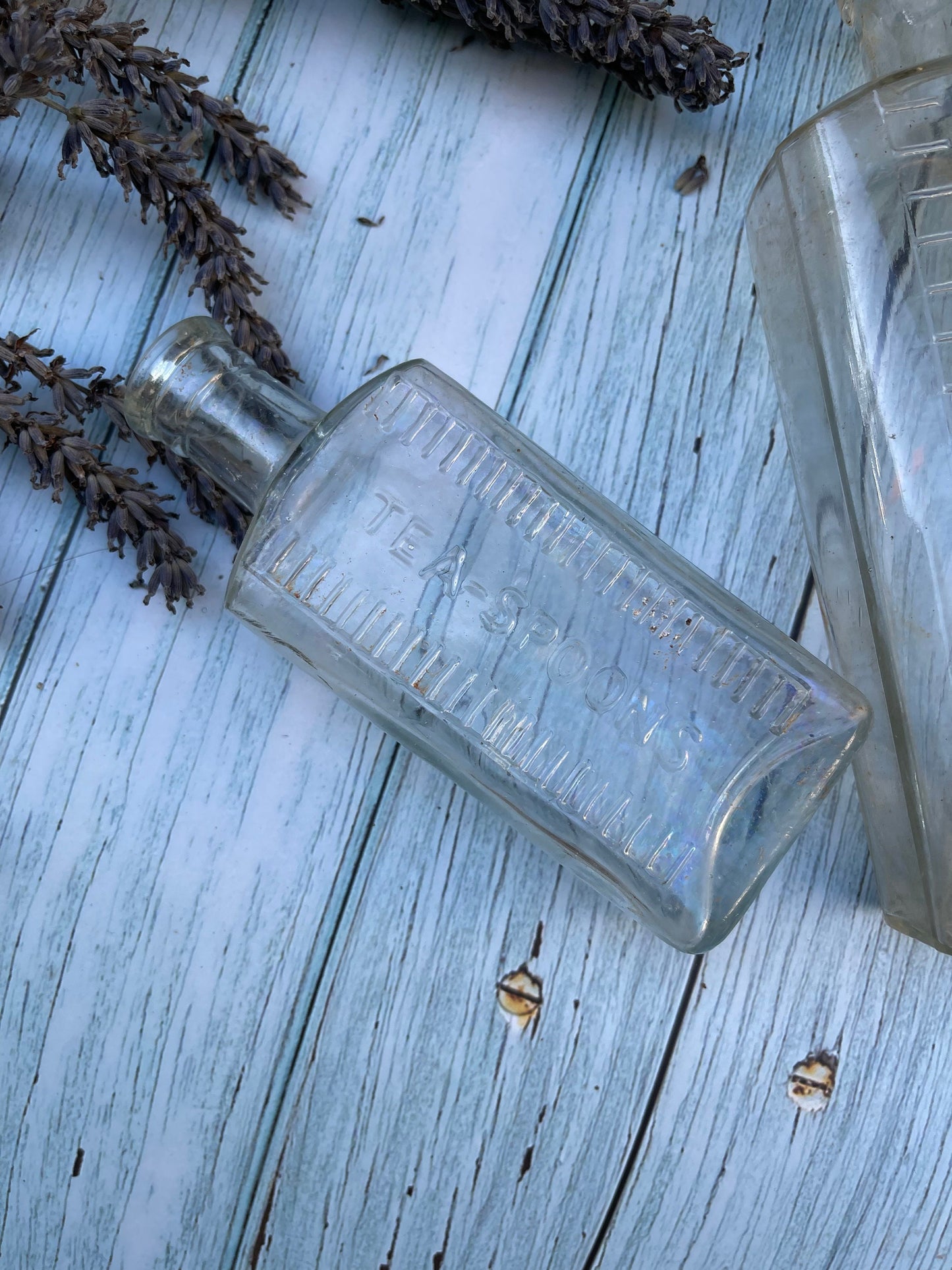 Three Vintage Clear Medicine Bottles with Teaspoon and Tablespoon Measures