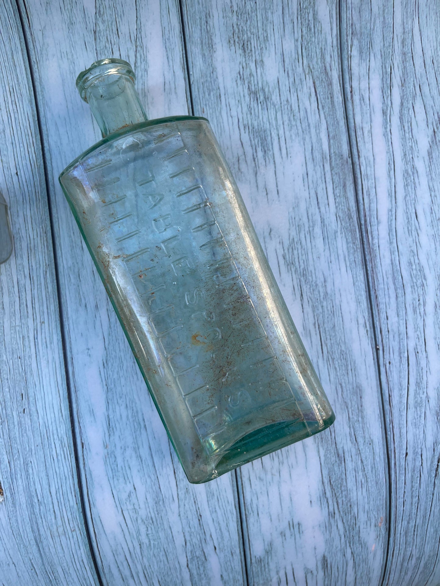 Three Vintage Clear Medicine Bottles with Teaspoon and Tablespoon Measures