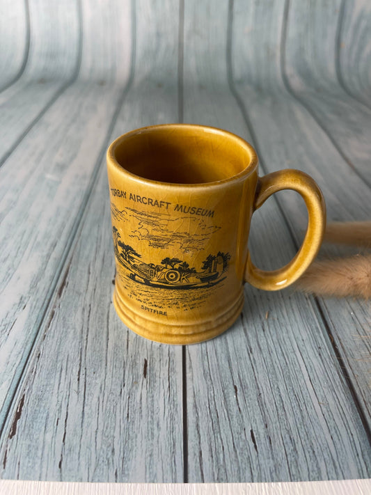 Small Vintage Souvenir Mug with Spitfire Aircraft Design from Torbay Aircraft Museum by Britannia Designs, Dartmouth, England