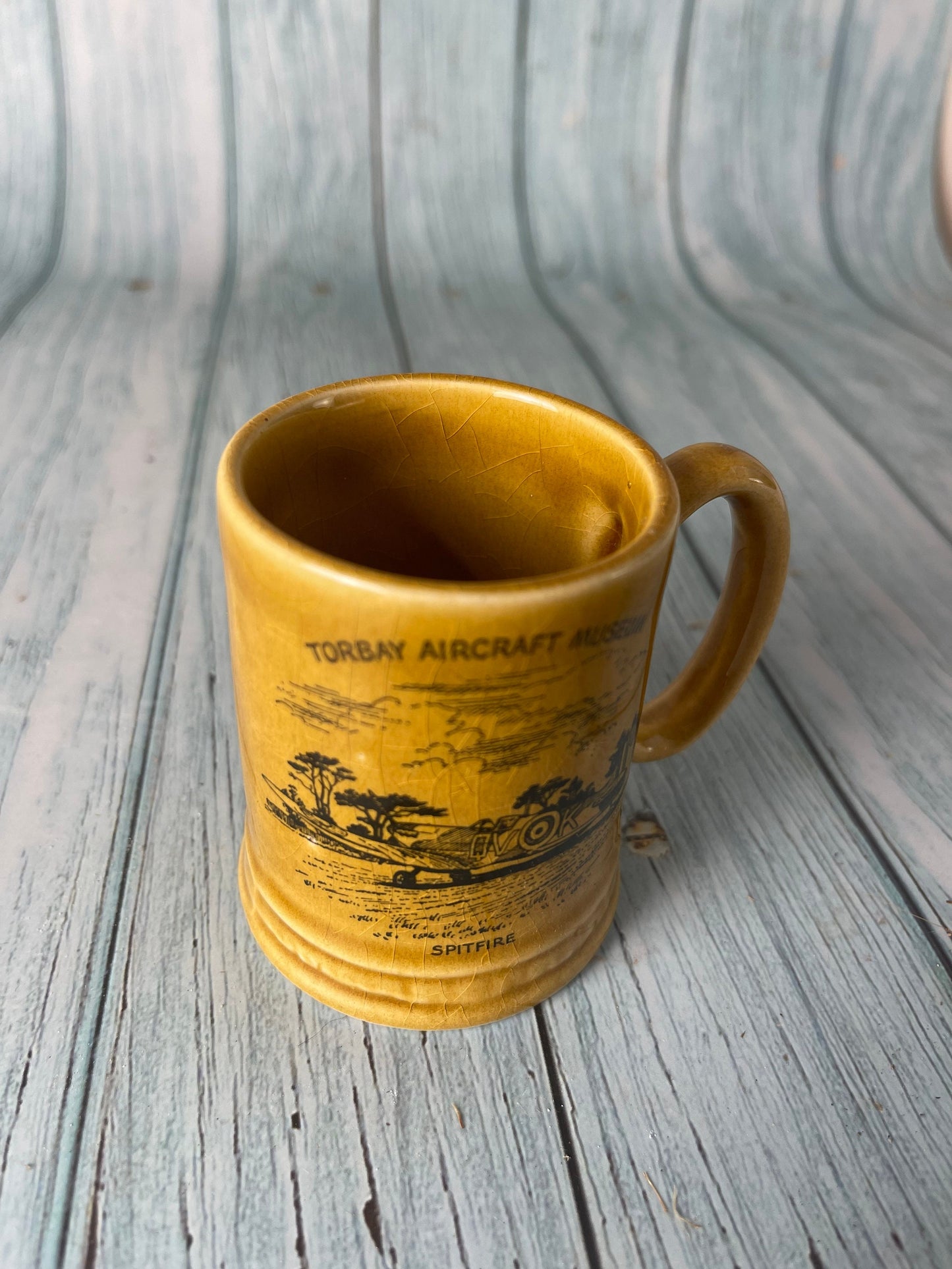 Small Vintage Souvenir Mug with Spitfire Aircraft Design from Torbay Aircraft Museum by Britannia Designs, Dartmouth, England