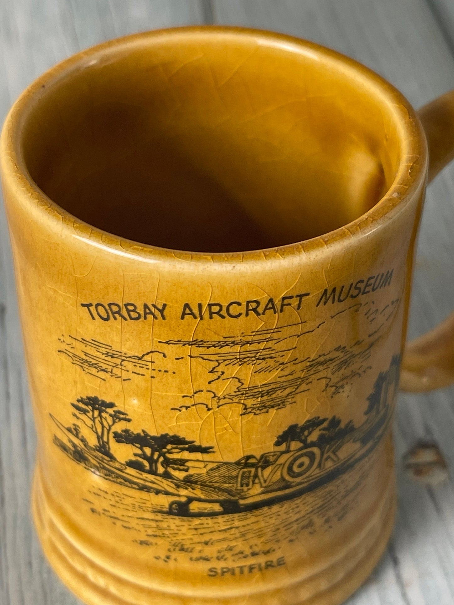 Small Vintage Souvenir Mug with Spitfire Aircraft Design from Torbay Aircraft Museum by Britannia Designs, Dartmouth, England