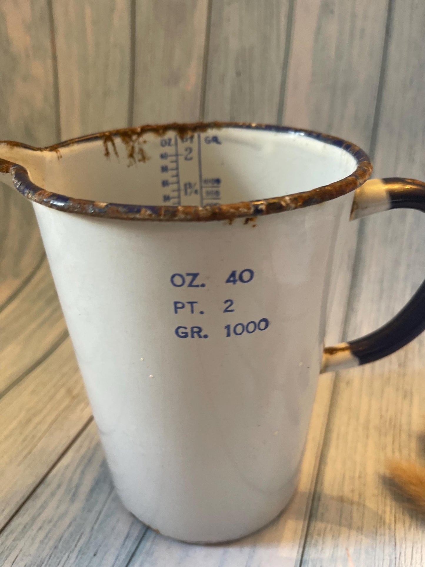 Vintage Chippy Enamel Measuring Jug: Rustic Blue and White Vase