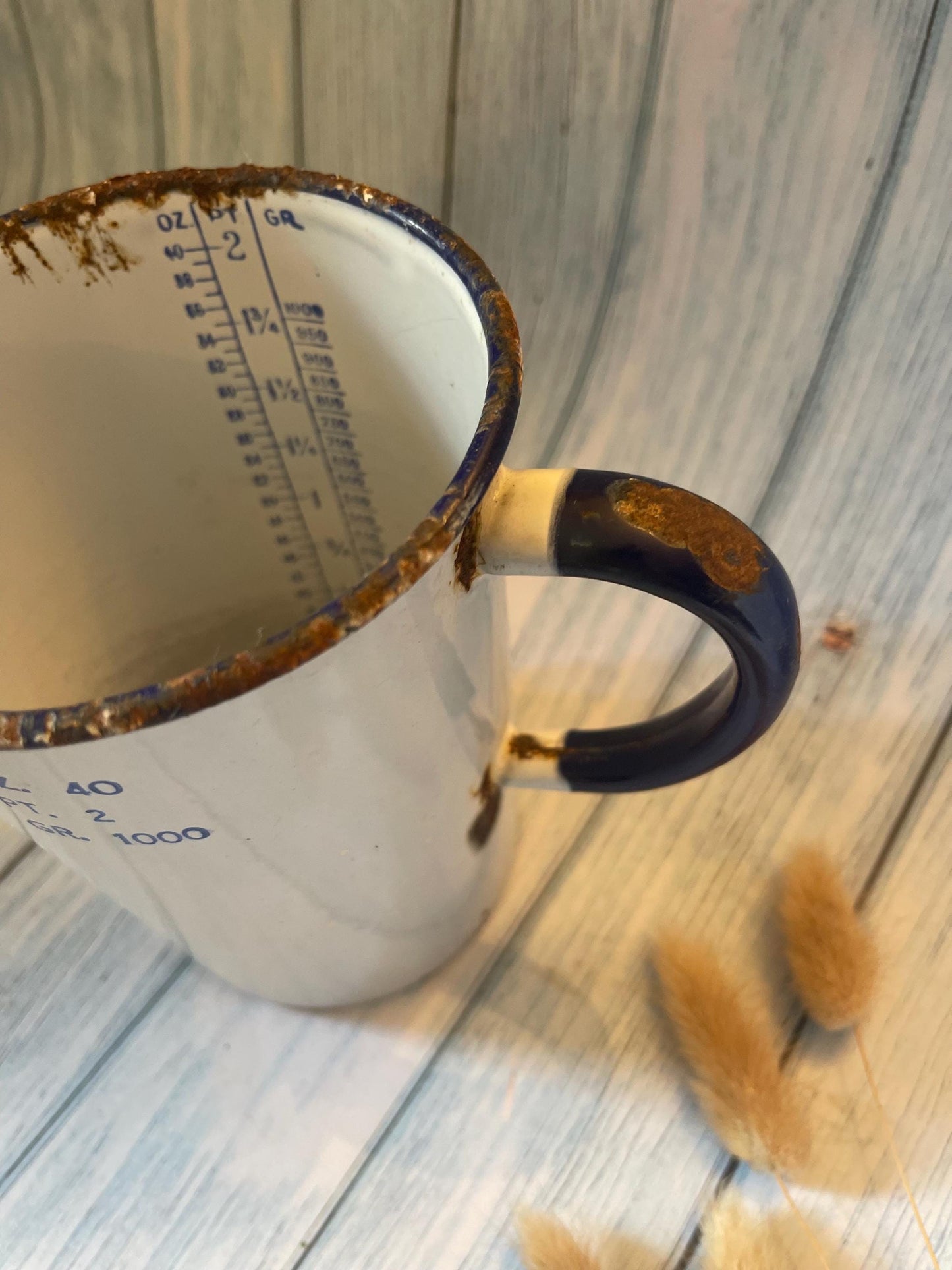 Vintage Chippy Enamel Measuring Jug: Rustic Blue and White Vase